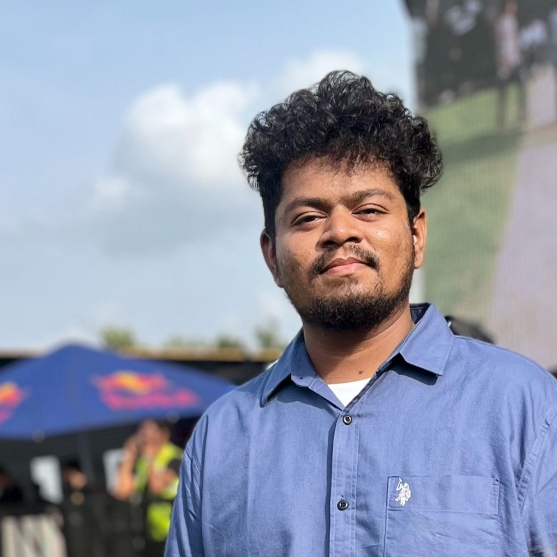 Gopi Kumar M wearing a blue shirt outdoors